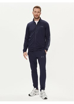Under Armour Dres Ua Knit Track Suit 1357139-410 Granatowy Fitted Fit ze sklepu MODIVO w kategorii Spodnie męskie - zdjęcie 182675723