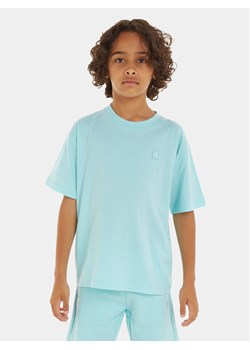 Calvin Klein Jeans T-Shirt Mono Mini Badge IU0IU00580 M Niebieski Regular Fit ze sklepu MODIVO w kategorii T-shirty chłopięce - zdjęcie 182675884