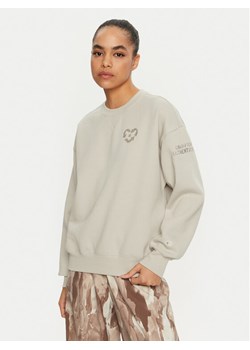 Champion Bluza 117494 Écru Loose Fit ze sklepu MODIVO w kategorii Bluzy damskie - zdjęcie 182676241