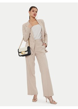 ViCOLO Spodnie materiałowe TB1562 Beżowy Relaxed Fit ze sklepu MODIVO w kategorii Spodnie damskie - zdjęcie 182676672