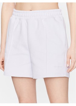 New Balance Szorty sportowe WS23552 Fioletowy Relaxed Fit ze sklepu MODIVO w kategorii Szorty - zdjęcie 182677220