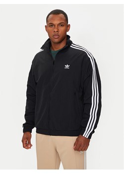 adidas Bluza adicolor Firebird IT2491 Czarny Loose Fit ze sklepu MODIVO w kategorii Bluzy męskie - zdjęcie 182678512
