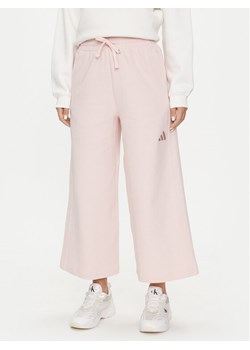 adidas Spodnie dresowe ALL SZN IY6831 Różowy Wide Leg ze sklepu MODIVO w kategorii Spodnie damskie - zdjęcie 182678963