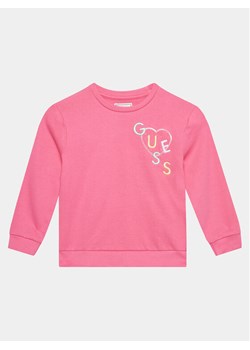Guess Bluza K4GQ00 KA6R3 Różowy Regular Fit ze sklepu MODIVO w kategorii Bluzy dziewczęce - zdjęcie 182679332