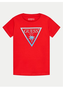 Guess T-Shirt L4GI33 J1311 Czerwony Regular Fit ze sklepu MODIVO w kategorii T-shirty chłopięce - zdjęcie 182679922