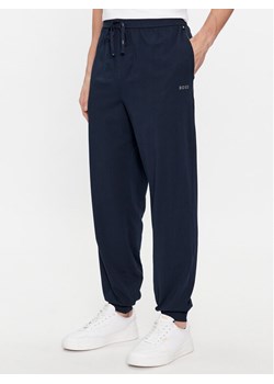 Boss Spodnie dresowe Mix&Match 50515365 Granatowy Regular Fit ze sklepu MODIVO w kategorii Spodnie męskie - zdjęcie 182679962