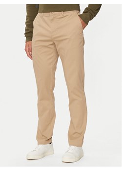 Tommy Hilfiger Chinosy Denton MW0MW37873 Beżowy Slim Fit ze sklepu MODIVO w kategorii Spodnie męskie - zdjęcie 182681221