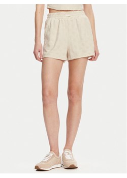 Guess Szorty sportowe V5GD16 KCT02 Beżowy Regular Fit ze sklepu MODIVO w kategorii Szorty - zdjęcie 182682772