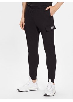 EA7 Emporio Armani Spodnie dresowe 8NPP59 PJ05Z 1200 Czarny Regular Fit ze sklepu MODIVO w kategorii Spodnie męskie - zdjęcie 182682800