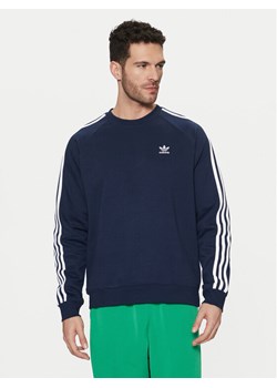 adidas Bluza adicolor Classics 3-Stripes IM4515 Granatowy Regular Fit ze sklepu MODIVO w kategorii Bluzy męskie - zdjęcie 182682900