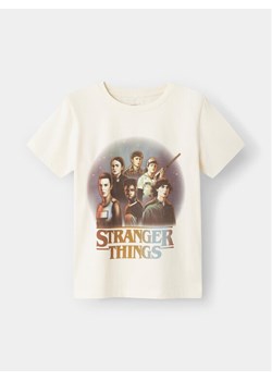 NAME IT T-Shirt STRANGER THINGS 13227698 Biały Regular Fit ze sklepu MODIVO w kategorii Bluzki dziewczęce - zdjęcie 182683794