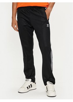 adidas Spodnie dresowe adicolor Classics Beckenbauer II5764 Czarny Slim Fit ze sklepu MODIVO w kategorii Spodnie męskie - zdjęcie 182687554