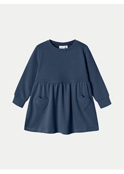 NAME IT Sukienka dzianinowa 13231933 Granatowy Relaxed Fit ze sklepu MODIVO w kategorii Sukienki dziewczęce - zdjęcie 182688280