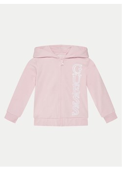 Guess Bluza K5RQ02 KA6R4 Różowy Regular Fit ze sklepu MODIVO w kategorii Bluzy dziewczęce - zdjęcie 182689051