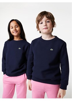Lacoste Bluza SJ5284 Granatowy Regular Fit ze sklepu MODIVO w kategorii Bluzy chłopięce - zdjęcie 182689282
