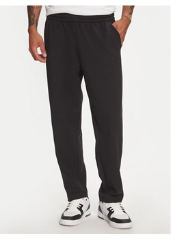 Champion Spodnie dresowe 219156 Czarny Regular Fit - id: 0000304764356 - marki Champion - 182690392 Champion Spodnie dresowe 219156 Czarny Regular Fit ze sklepu MODIVO w kategorii Spodnie męskie - zdjęcie 182690392