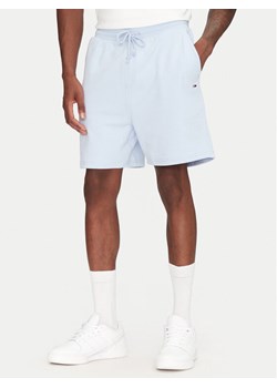 Tommy Jeans Szorty sportowe Entry GraphicDM0DM21369 Błękitny Regular Fit ze sklepu MODIVO w kategorii Spodenki męskie - zdjęcie 182690730