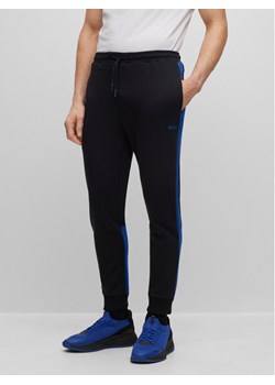 Boss Spodnie dresowe Hadiko 1 50493505 Czarny Regular Fit ze sklepu MODIVO w kategorii Spodnie męskie - zdjęcie 182690831