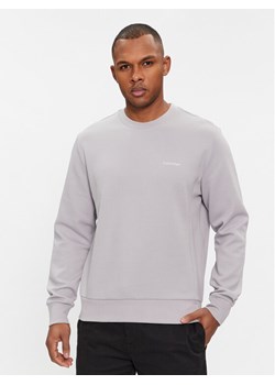 Calvin Klein Bluza Micro Logo K10K109926 Szary Regular Fit ze sklepu MODIVO w kategorii Bluzy męskie - zdjęcie 182690870