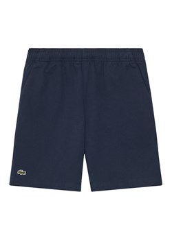 Lacoste Szorty sportowe FJ5242 Granatowy Regular Fit ze sklepu MODIVO w kategorii Spodenki chłopięce - zdjęcie 182691324