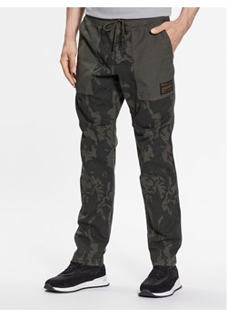 Replay Spodnie materiałowe M9933.000.73908 Khaki Regular Fit ze sklepu MODIVO w kategorii Spodnie męskie - zdjęcie 182691394