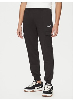 Puma Spodnie dresowe Ess No. 1 Logo Cargo 682661 Czarny Regular Fit ze sklepu MODIVO w kategorii Spodnie męskie - zdjęcie 182691783
