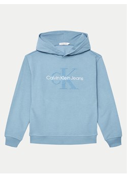 Calvin Klein Jeans Bluza Peached Terry Monologo IB0IB02142 Niebieski Regular Fit ze sklepu MODIVO w kategorii Bluzy chłopięce - zdjęcie 182692204