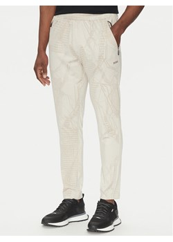 BOSS Spodnie dresowe Hicon Desert Active 50537761 Beżowy Slim Fit ze sklepu MODIVO w kategorii Spodnie męskie - zdjęcie 182692590