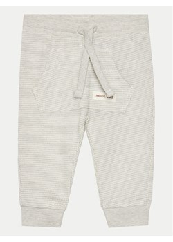 Coccodrillo Spodnie dresowe WC4120104DEN Szary Regular Fit ze sklepu MODIVO w kategorii Spodnie i półśpiochy - zdjęcie 182692643