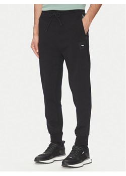 BOSS Spodnie dresowe Hadiko 50537198 Czarny Regular Fit ze sklepu MODIVO w kategorii Spodnie męskie - zdjęcie 182692744