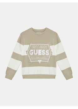 Guess Sweter L5RQ09 KCCH0 Beżowy Regular Fit ze sklepu MODIVO w kategorii Swetry dziewczęce - zdjęcie 182693040