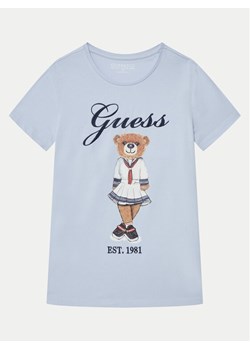 Guess T-Shirt J5RI24 K6YW4 Błękitny Regular Fit ze sklepu MODIVO w kategorii Bluzki dziewczęce - zdjęcie 182693773