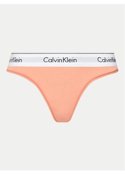 Calvin Klein Underwear Stringi 0000F3786E Koralowy ze sklepu MODIVO w kategorii Majtki damskie - zdjęcie 182694291