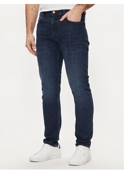 Tommy Hilfiger Jeansy Houston MW0MW34516 Granatowy Tapered Fit ze sklepu MODIVO w kategorii Jeansy męskie - zdjęcie 182694861