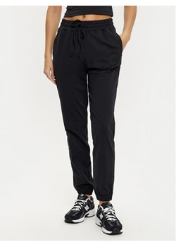 Girlfriend Collective Spodnie dresowe ReSet 6016 Czarny Slim Fit ze sklepu MODIVO w kategorii Spodnie damskie - zdjęcie 182695200
