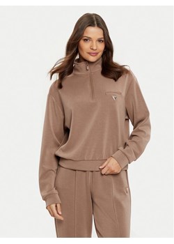 Guess Bluza V5RQ10 KCAY2 Brązowy Regular Fit ze sklepu MODIVO w kategorii Bluzy damskie - zdjęcie 182695900