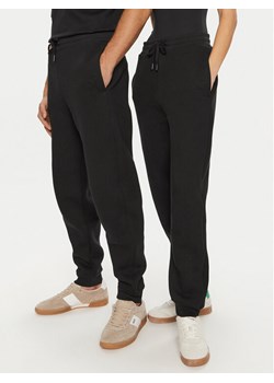 AMI PARIS Spodnie dresowe UTR237.749 Czarny Relaxed Fit ze sklepu MODIVO w kategorii Spodnie damskie - zdjęcie 182697452