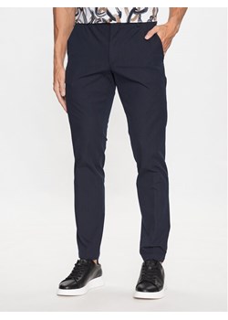Boss Spodnie materiałowe Kaito1_T 50487754 Granatowy Slim Fit ze sklepu MODIVO w kategorii Spodnie męskie - zdjęcie 182697983