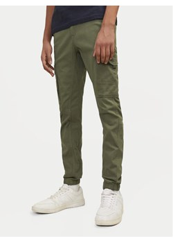 Jack&Jones Junior Spodnie materiałowe Paul 12151639 Zielony Slim Fit ze sklepu MODIVO w kategorii Spodnie chłopięce - zdjęcie 182698020
