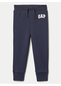 Gap Spodnie dresowe 633913-15 Granatowy Regular Fit ze sklepu MODIVO w kategorii Spodnie chłopięce - zdjęcie 182698264