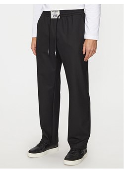 Just Cavalli Spodnie dresowe 77OAAR11 Czarny Regular Fit ze sklepu MODIVO w kategorii Spodnie męskie - zdjęcie 182700584