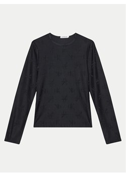 Calvin Klein Jeans Bluzka IG0IG02536 Czarny Slim Fit ze sklepu MODIVO w kategorii T-shirty chłopięce - zdjęcie 182700632