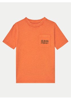 Guess T-Shirt L5RI30 K8HM4 Pomarańczowy Regular Fit ze sklepu MODIVO w kategorii T-shirty chłopięce - zdjęcie 182700872