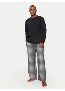 Calvin Klein Underwear Spodnie piżamowe 000NM2842E Szary Relaxed Fit ze sklepu MODIVO w kategorii Piżamy męskie - zdjęcie 182700912