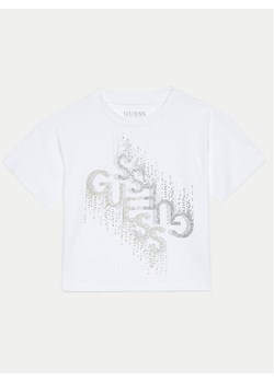 Guess T-Shirt J4BI05 J1314 Biały Boxy Fit ze sklepu MODIVO w kategorii Bluzki dziewczęce - zdjęcie 182701872