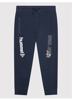 Hummel Spodnie dresowe SPACE JAM On 215874 Granatowy Regular Fit ze sklepu MODIVO w kategorii Spodnie chłopięce - zdjęcie 182701873