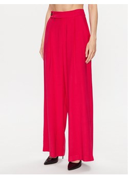 DKNY Spodnie palazzo P3EK8Q84 Różowy Regular Fit ze sklepu MODIVO w kategorii Spodnie damskie - zdjęcie 182702241