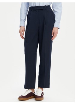 Tommy Hilfiger Chinosy WW0WW44793 Granatowy Tapered Fit ze sklepu MODIVO w kategorii Spodnie damskie - zdjęcie 182703593