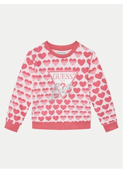 Guess Bluza K5RQ01 KA6R4 Różowy Regular Fit ze sklepu MODIVO w kategorii Bluzy dziewczęce - zdjęcie 182703752