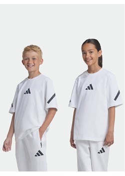 adidas T-Shirt Z.N.E. JJ4144 Biały Loose Fit ze sklepu MODIVO w kategorii Bluzki dziewczęce - zdjęcie 182704102